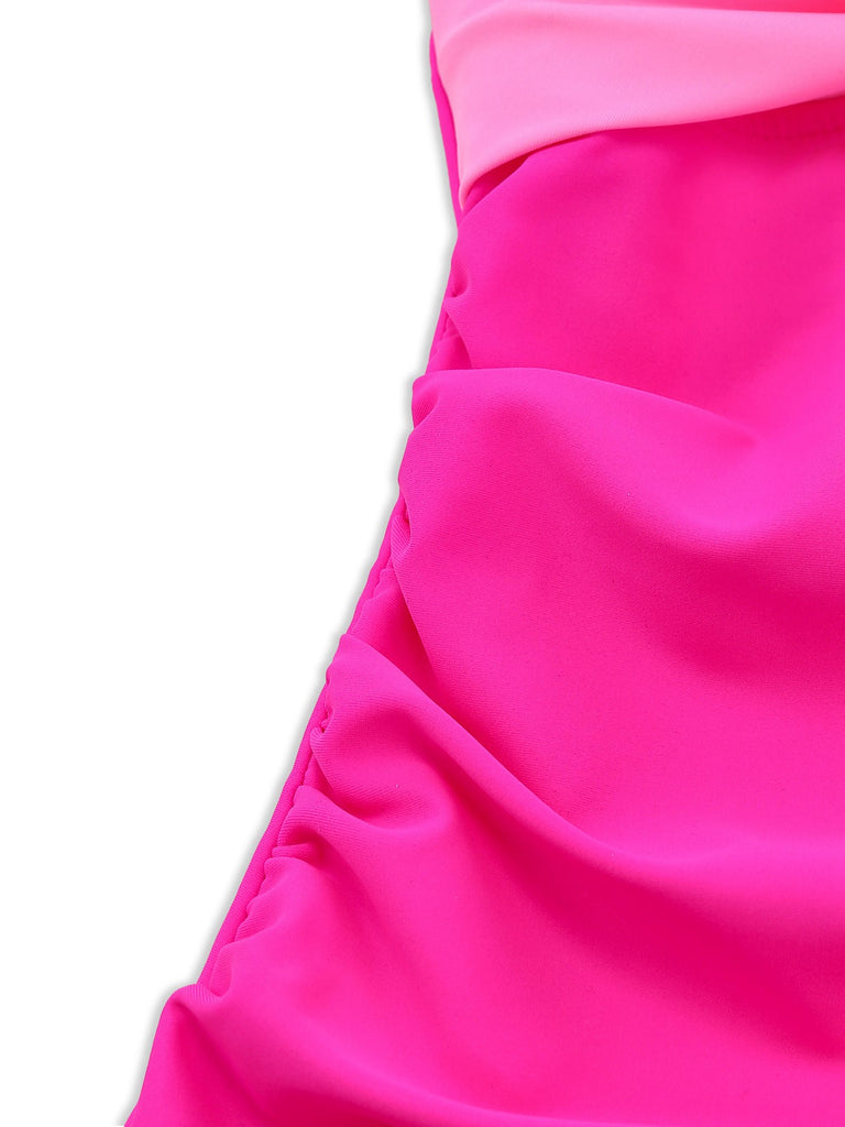Close-up of bright pink fabric on a white background
