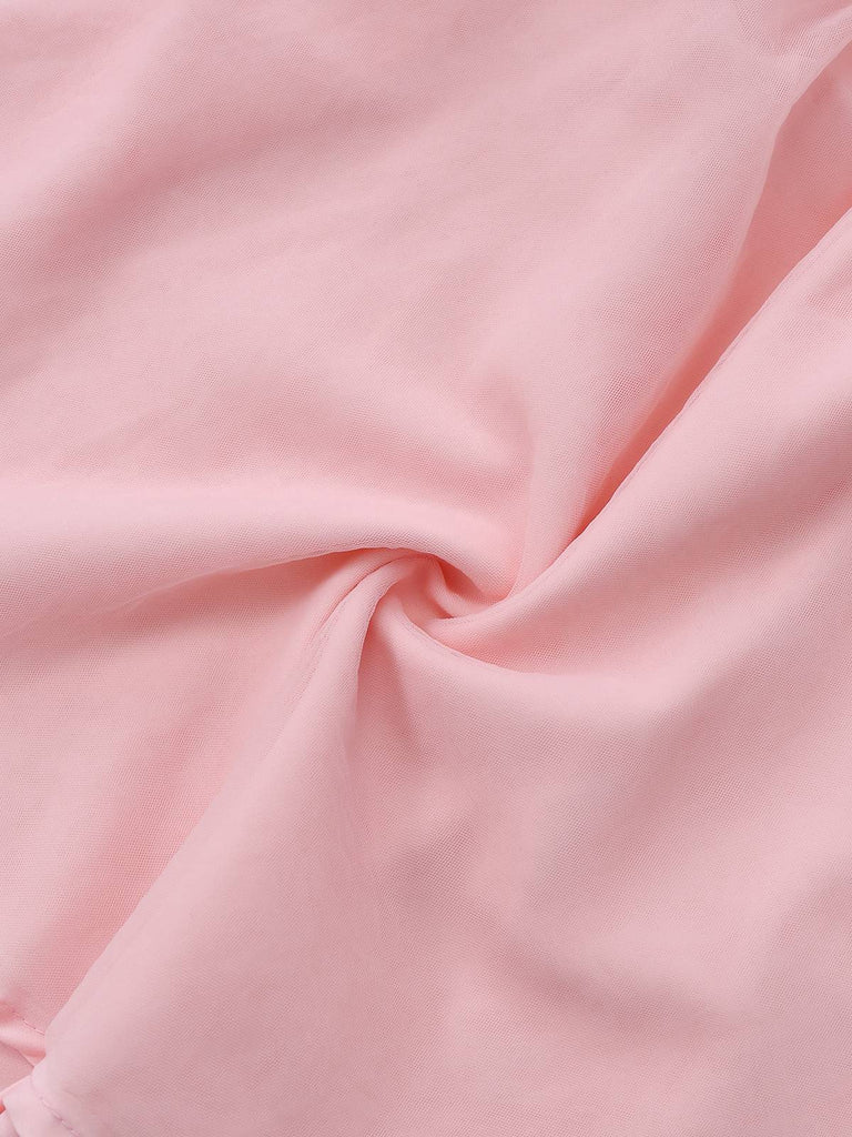 Close-up of pink fabric with folds