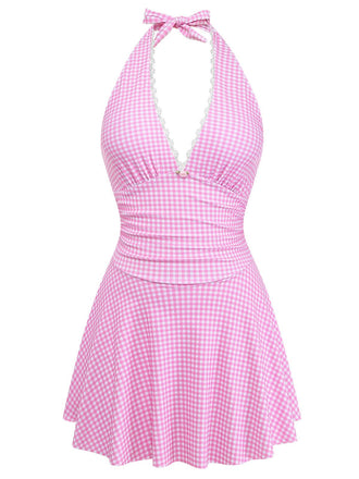 Pink gingham dress with a halter neck on a white background