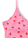 Pink top with red strawberry pattern on a white background