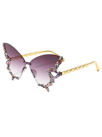 Sunglasses with floral embellishments on a white background