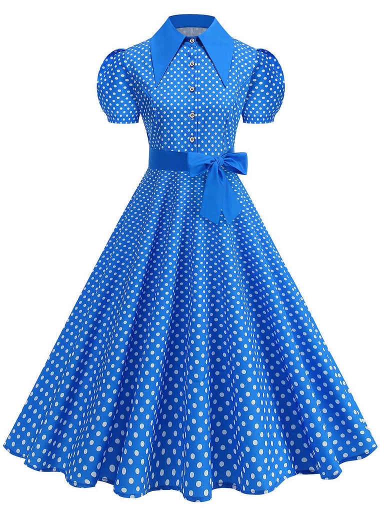 Robe trapèze vintage à pois, ceinturée et à col chemise, dans un style rétro classique des années 1950.