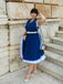 Robe à revers sans manches bleu marine des années 1960