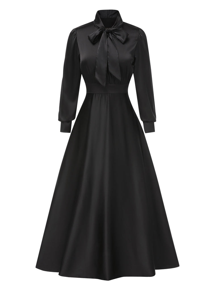 Robe noire en satin à col noué manches évasées années 1950