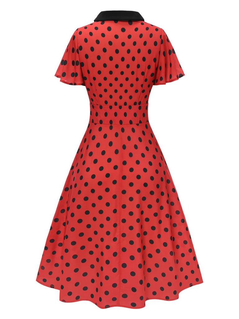 Robe rouge foncé à col en V et à pois des années 1950