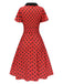 Robe rouge foncé à col en V et à pois des années 1950