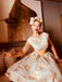 Robe jaune à fleurs antique col bateau ceinturée années 1950