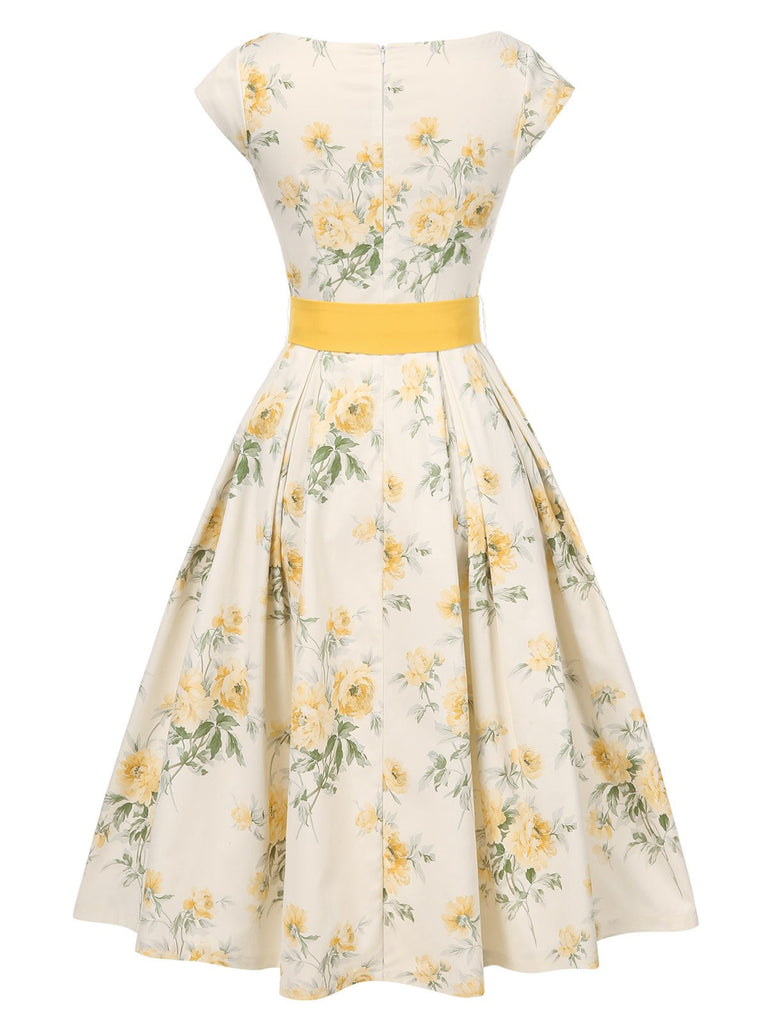 [Prévente] Robe jaune à fleurs antique col bateau ceinturée années 1950