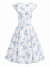 Robe jaune à fleurs col bateau ceinturée années 1950