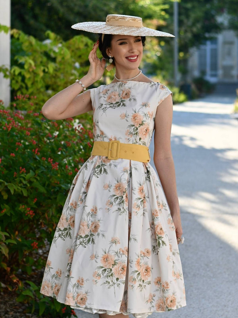 Robe jaune à fleurs antique col bateau ceinturée années 1950