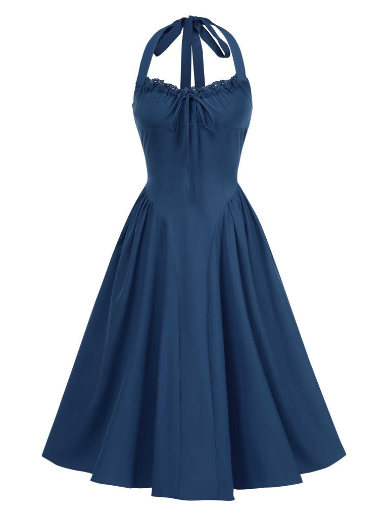 Robe dos nu à lacets et taille basque unie des années 1950