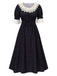 Robe noire en dentelle patchwork à pois floraux des années 1940