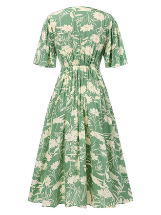 Robe verte fleurs col V des années 1940