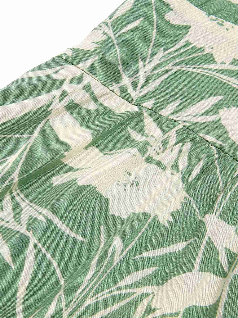 Robe verte fleurs col V des années 1940