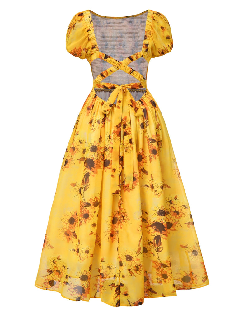 Robe mi-longue jaune tournesol manches bouffantes des années 1970