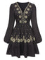 Robe noire à fleurs brodées et décolletée V profond années 1940