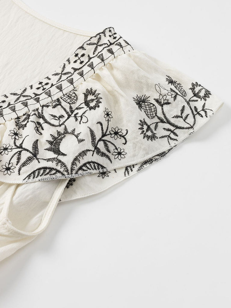Robe col V à volants floraux blanc des années 1970