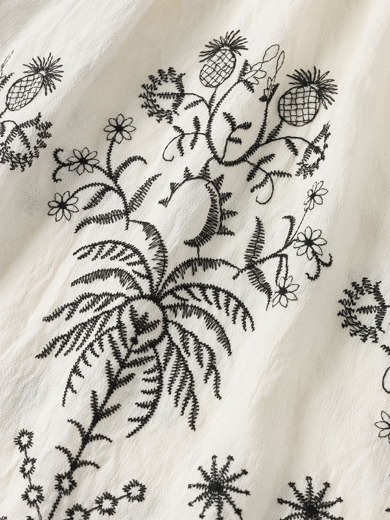 Robe col V à volants floraux blanc des années 1970