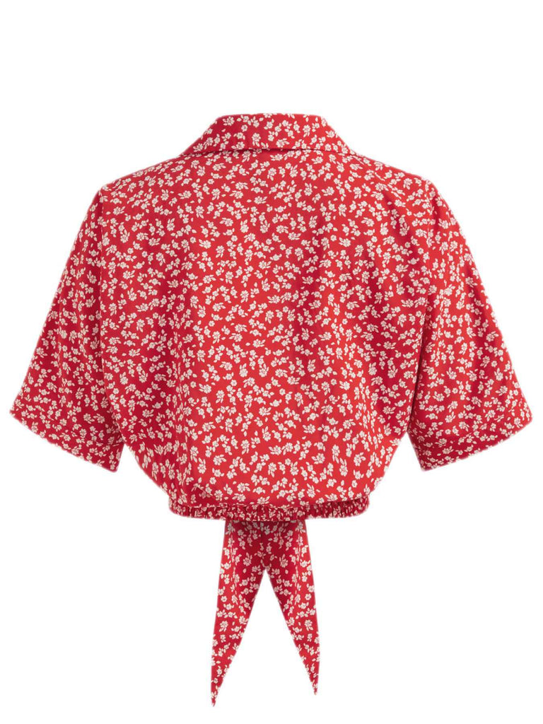 Chemisier rouge à fleurs à revers avec nœud des années 1950