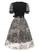 Robe patchwork noire en maille brodée des années 1950