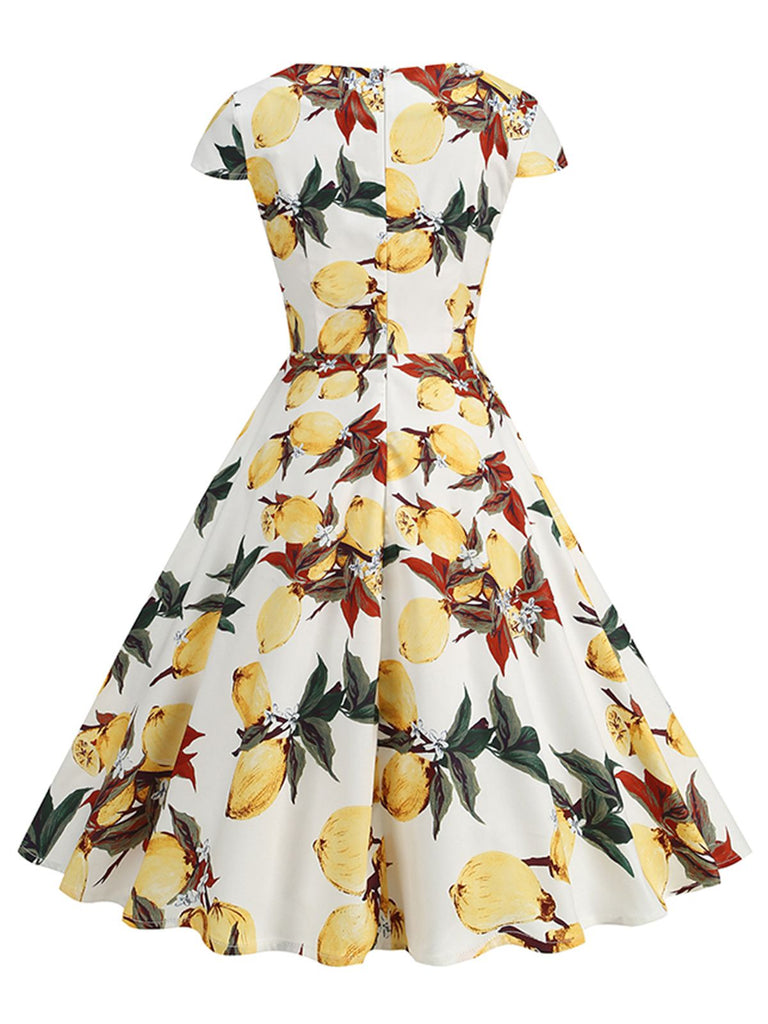 Robe Jaune motif citron surplombante col V des années 1950