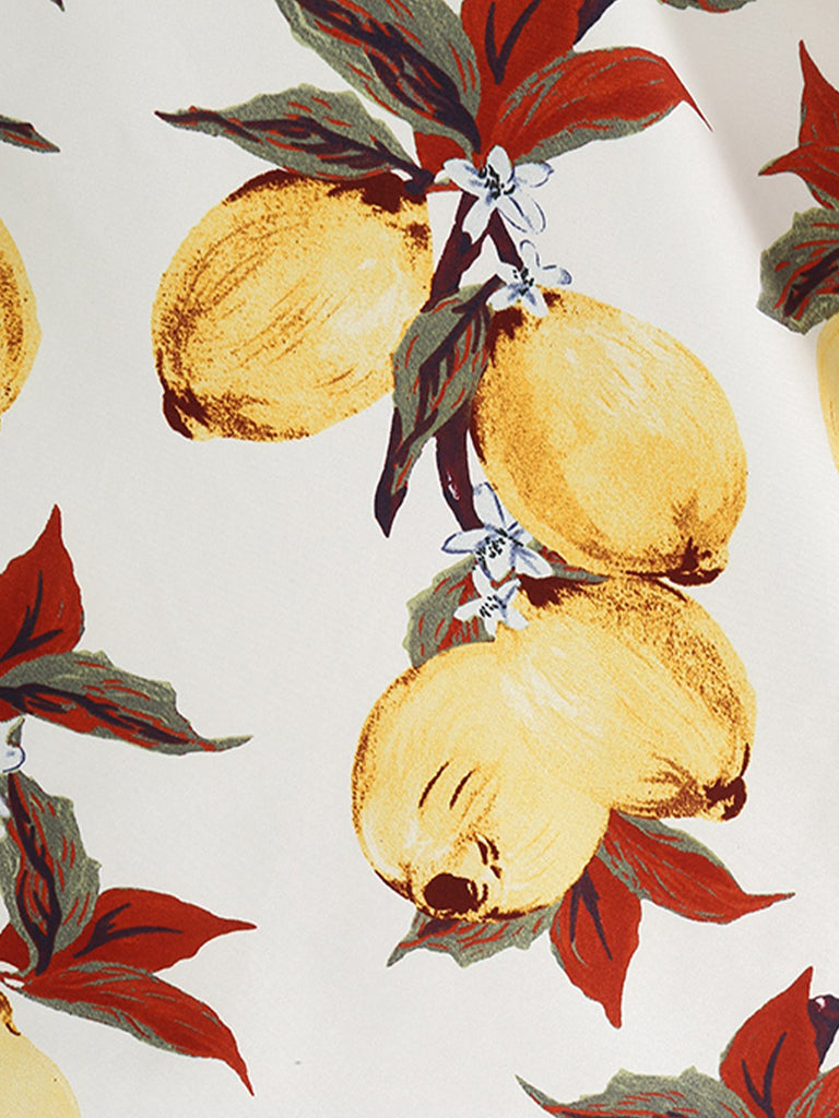 Robe Jaune motif citron surplombante col V des années 1950