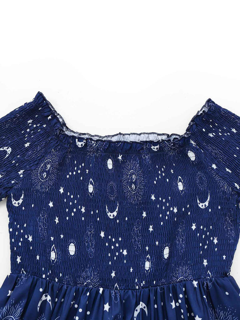 Robe bleue à épaules dénudées et étoiles et lune années 1950