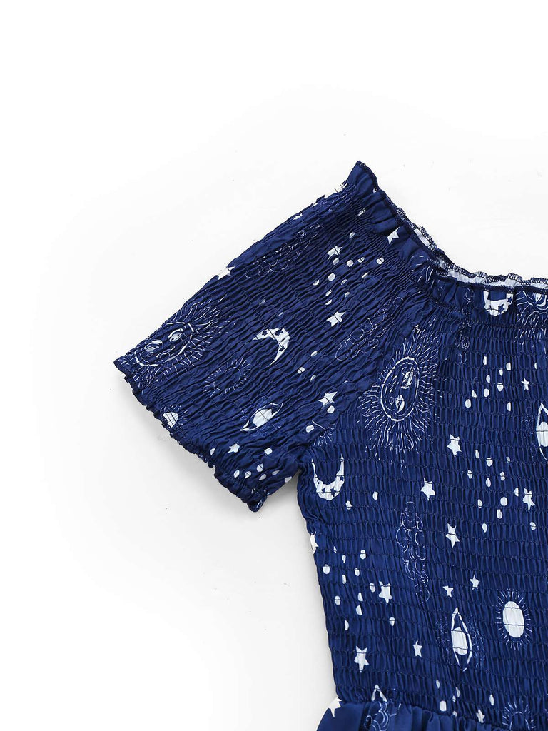 Robe bleue à épaules dénudées et étoiles et lune années 1950
