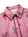 Robe rose à imprimé dessins animés col revers avec ceinture des années 1960