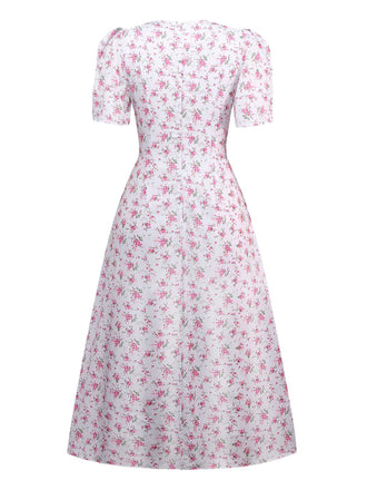 Robe lavande col V manches bouffantes à petites fleurs des années 1940