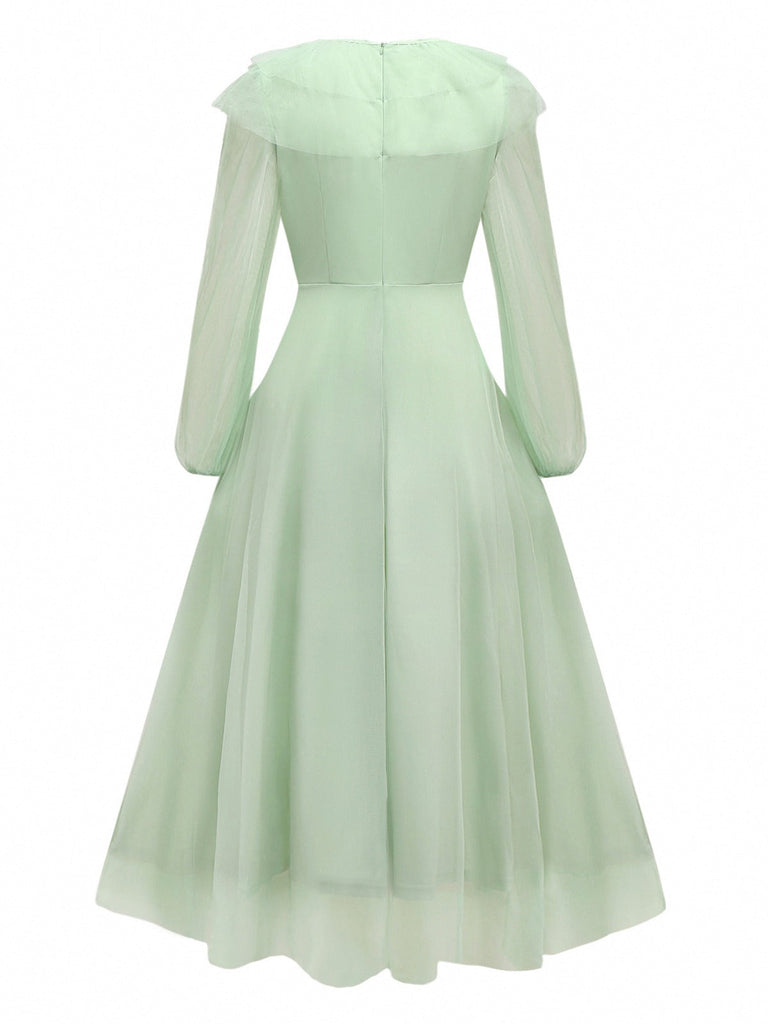 Robe verte en maille unie à volants manches illusion des années 1930