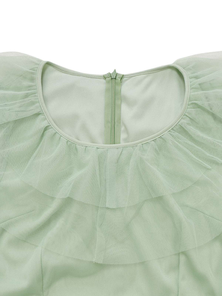 Robe verte en maille unie à volants manches illusion des années 1930