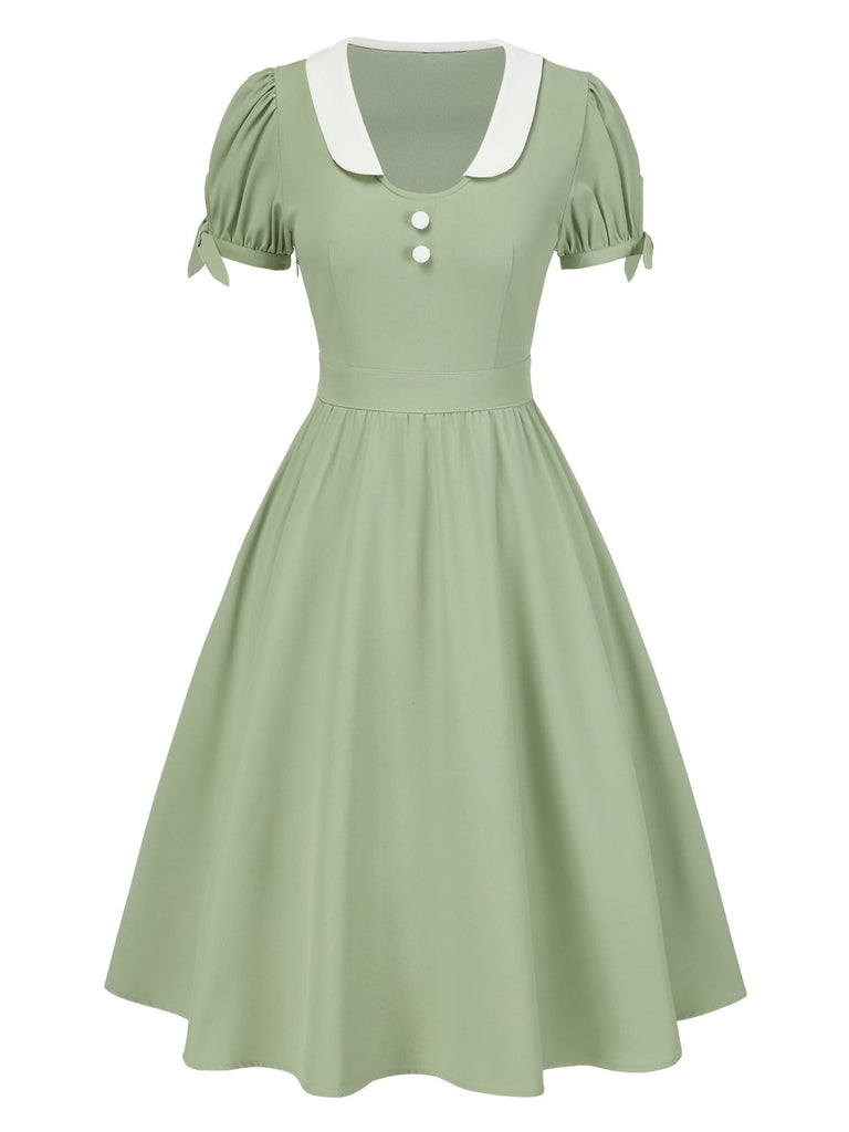 [Prévente] Robe à revers verte colorblock et poignets à nœud années 1950