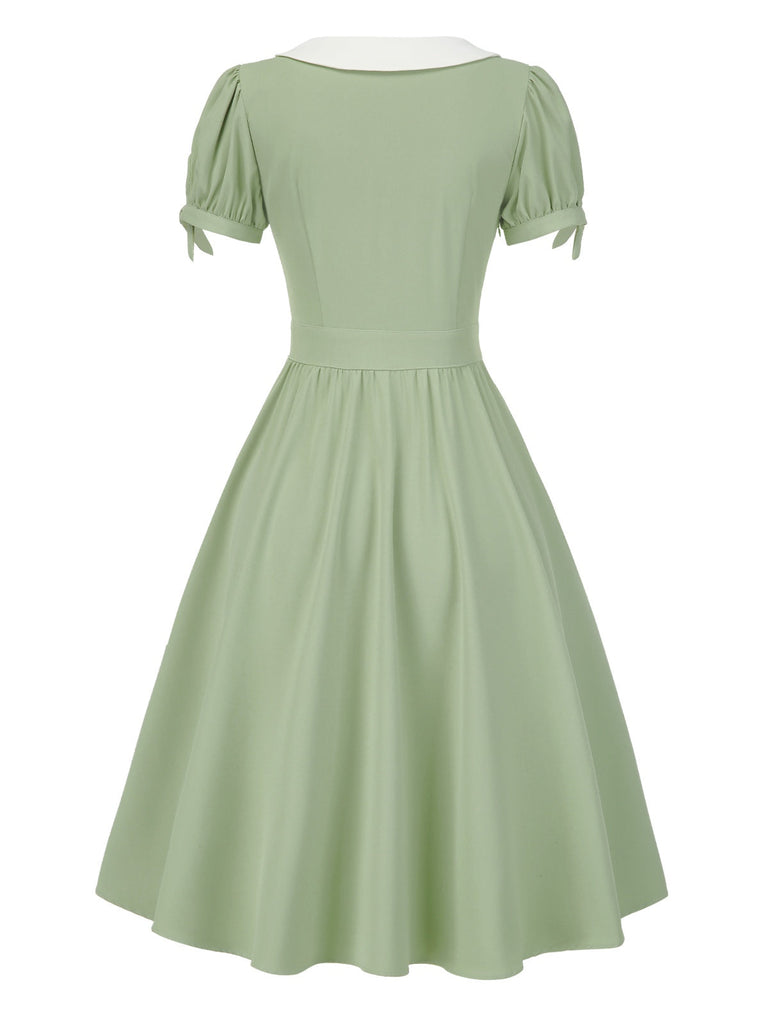 [Prévente] Robe à revers verte colorblock et poignets à nœud années 1950