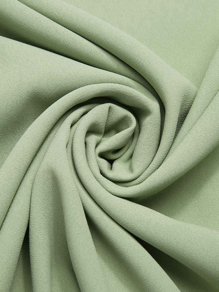 [Prévente] Robe à revers verte colorblock et poignets à nœud années 1950