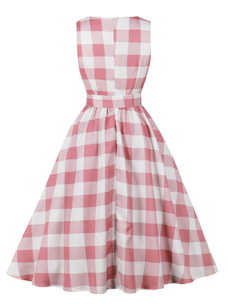Robe rose Ă  carreaux vichy avec nĆud et boutons annĂ©es 1950