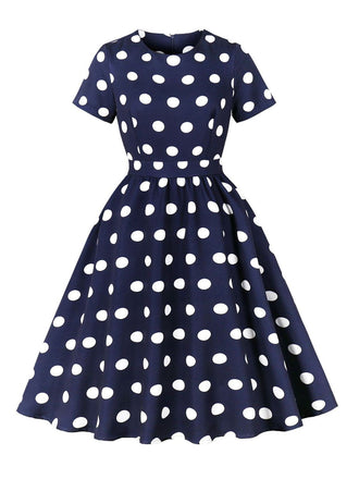 Robe trapèze bleu foncé à pois des années 1950