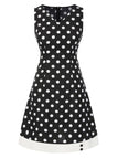 Robe noire à pois et col en V des années 1960