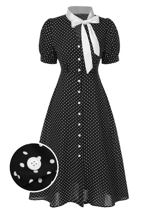 Robe noire à pois et col noué des années 40