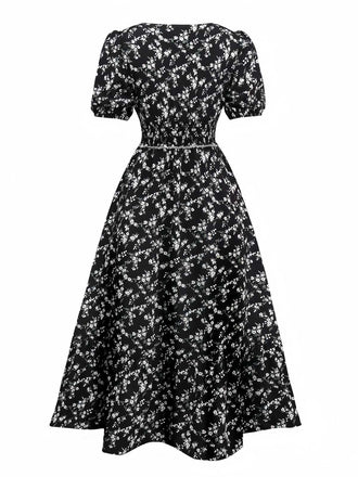 Robe noire à fleurs manches bouffantes à col en V années 1940