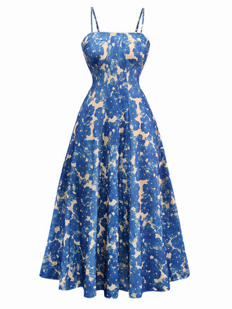 Robe bleue à bretelles motif floral des années 1940