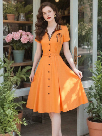 Robe orange à pois en coton et revers années 1940