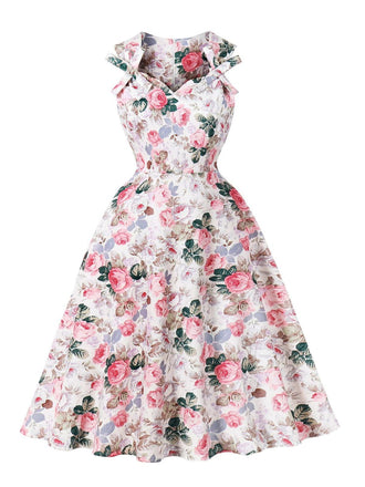 Robe trapèze rose motif fleurs et col en cœur des années 1950