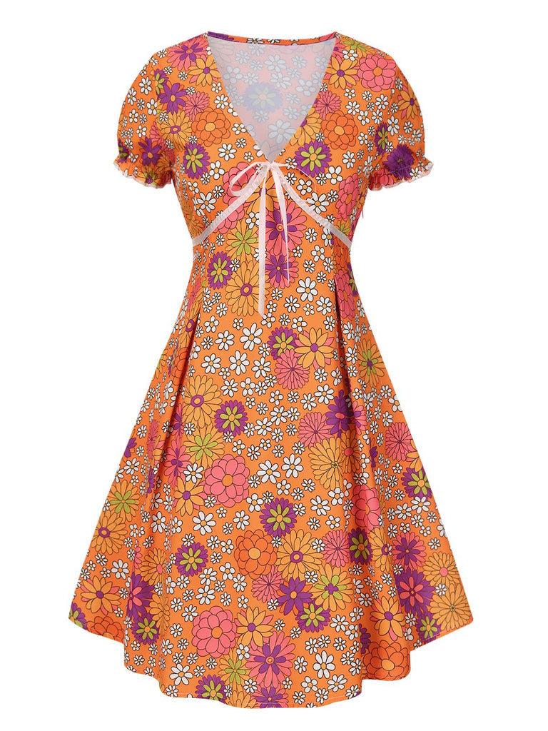 [Prévente] Mini-robe orange à psychédélique et nœud années 1970