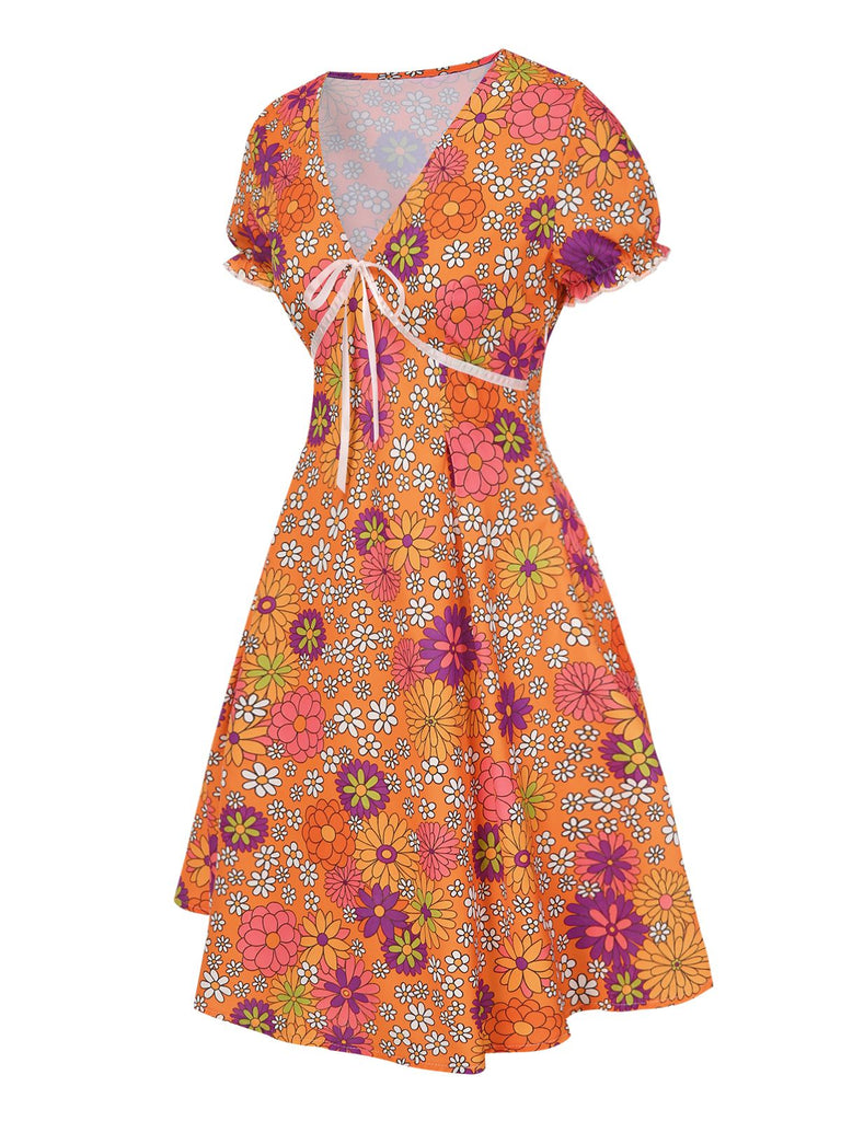 [Prévente] Mini-robe orange à psychédélique et nœud années 1970