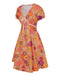 [Prévente] Mini-robe orange à psychédélique et nœud années 1970
