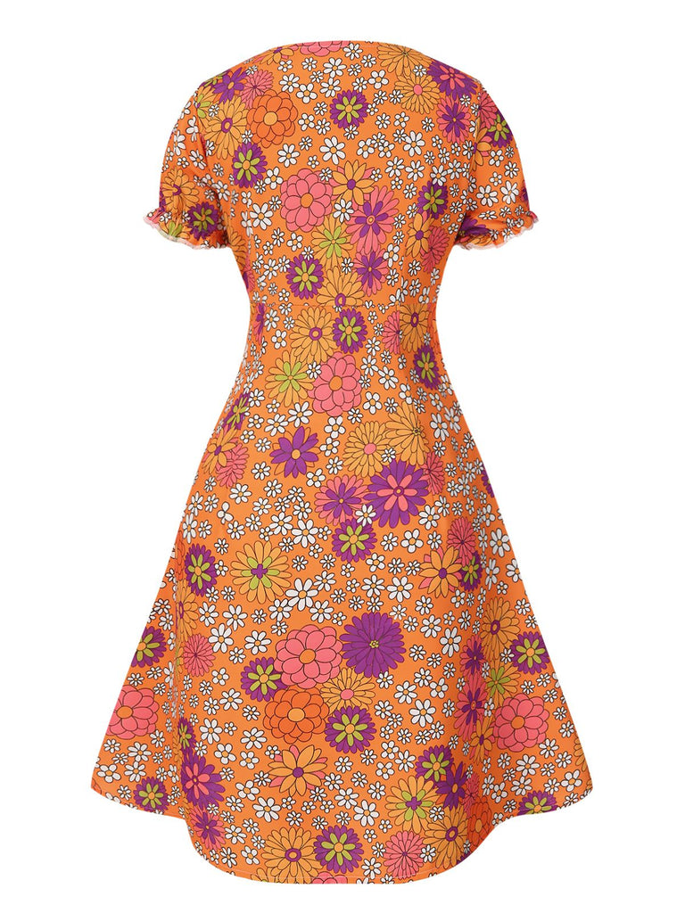 [Prévente] Mini-robe orange à psychédélique et nœud années 1970