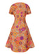 [Prévente] Mini-robe orange à psychédélique et nœud années 1970