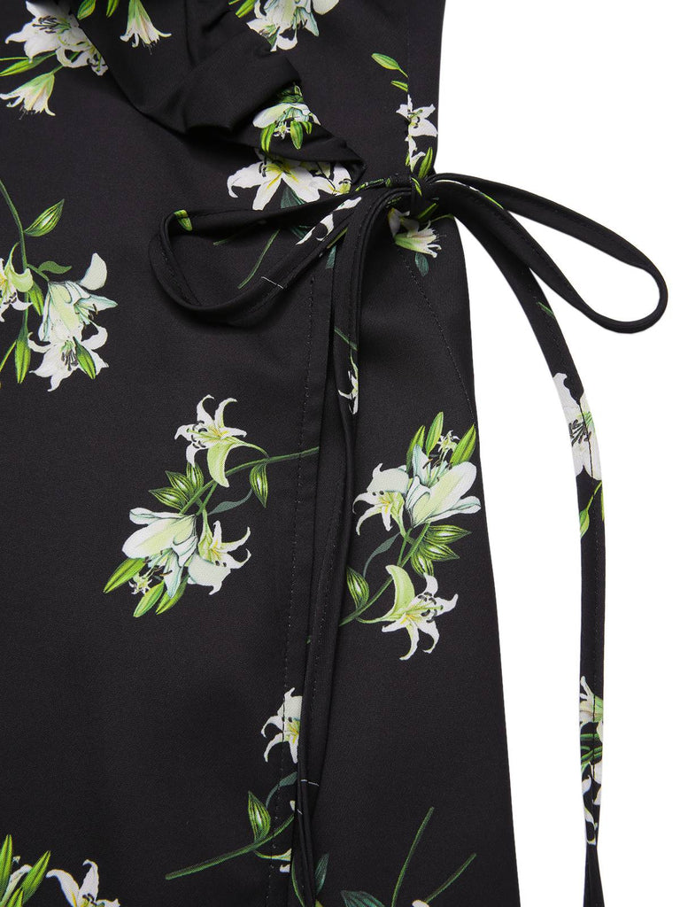 [Prévente] Robe noire à volants et col en V imprimé lys des années 1950