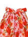 Robe rouge à fleurs dos nu col rond des années 40
